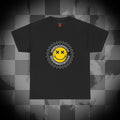 Just a mom trying not to raise assholes Unisex Heavy Cotton Tee